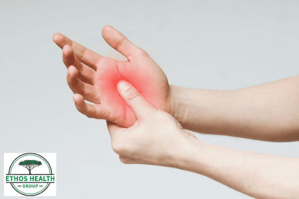 Picture of pressing a palm with thumb to show Neuropathy effects
